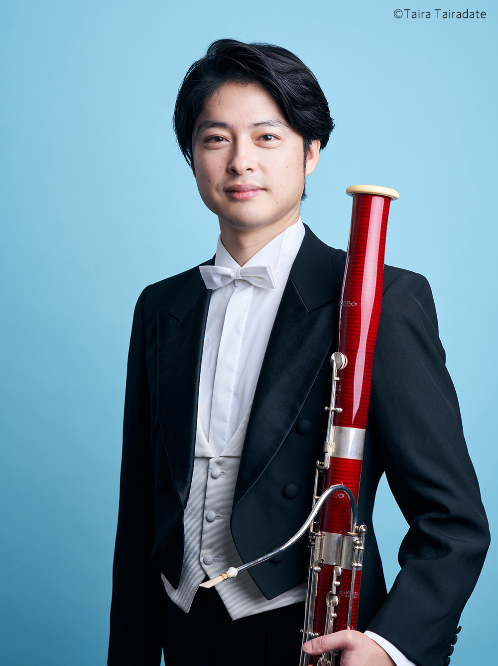 長哲也